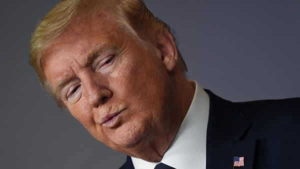 US President Donald Trump looks on during the daily briefing on the novel coronavirus, which causes COVID-19, in the Brady Briefing Room of the White House on April 24, 2020, in Washington, DC. Olivier DOULIERY / AFP