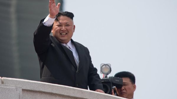 North Korean leader Kim Jong Un is "alive and well", a top security adviser to the South's President Moon Jae-in said late on April 26, 2020, downplaying rumours over Kim's health following his absence from a key anniversary. ED JONES / AFP