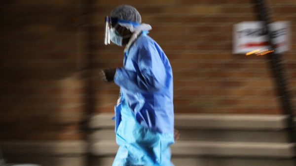 Medical workers work a night shift outside of a special coronavirus intake area at Maimonides Medical Center on April 15, 2020 in the Borough Park neighborhood of the Brooklyn borough of New York City. Hospitals in New York City, which have been especially hard hit by the coronavirus, are still struggling with an influx of COVID-19 cases. Spencer Platt/Getty Images SPENCER PLATT / GETTY IMAGES NORTH AMERICA / Getty Images via AFP