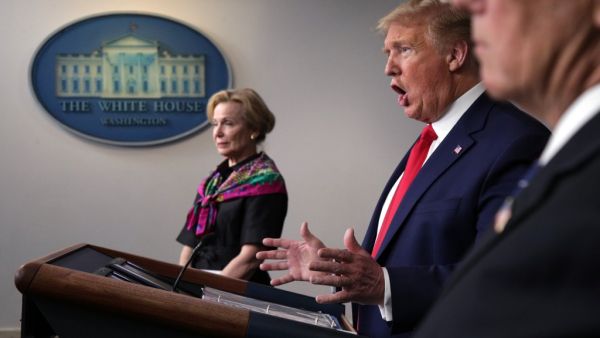 U.S. President Donald Trump speaks as White House coronavirus response coordinator Deborah Birx looks on at the daily coronavirus briefing at the White House April 20, 2020 in Washington, DC. AFP/File