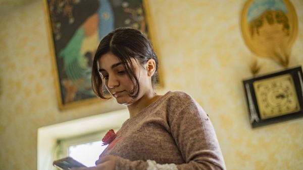 Layla Eido, a teenager from Iraq's minority Yazidi community, is pictured in the countryside of Syria's northeastern province of Hasakeh on April 23, 2020. Years after jihadists stole her away to Syria, Eido finally recontacted her family in Iraq several months ago. But a coronavirus lockdown has delayed their long-awaited reunion. She has been stuck in northeast Syria since the Islamic State group's so-called "caliphate" collapsed last year, ending her jihadist captivity. But just when she was on the cusp 