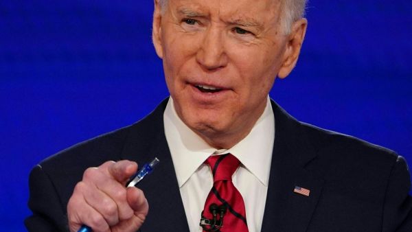 In this file photo Democratic presidential hopeful former US vice president Joe Biden takes part in the 11th Democratic Party 2020 presidential debate in a CNN Washington Bureau studio in Washington, DC on March 15, 2020. Joe Biden won the endorsement for US president April 27, 2020 of Nancy Pelosi, who hailed him as a "voice of reason" capable of leading America out of the coronavirus crisis.Pelosi was the last leading Democrat to endorse formally Biden's run for the White House against Republican Donald T