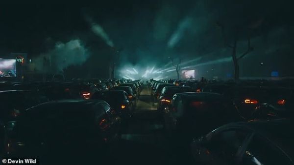 Drive-through raving: Cars sit in Club Index's car park as people inside listen and dance along to DJ Devin Wilds drive-through DJ set in Germany. (Devin Wild)