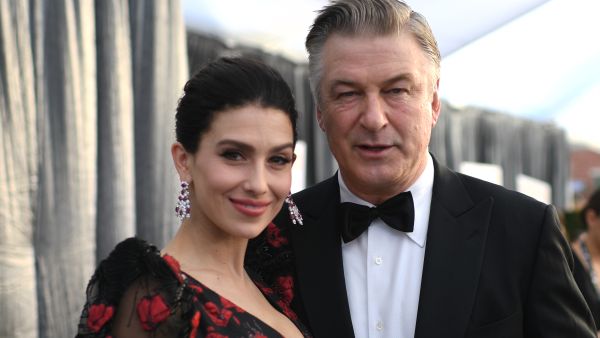 Actor Alec Baldwin (R) and wife Hilaria Baldwin walk the red carpet at the 25th Annual Screen Actors Guild Awards at the Shrine Auditorium in Los Angeles on January 27, 2019. (Photo by Robyn Beck / AFP)
