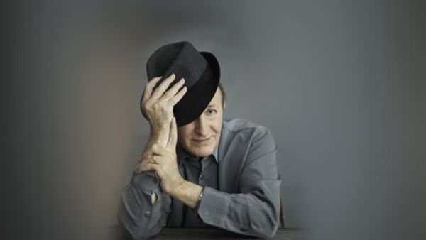 “the style of Idir music, with lone vocals and acoustic guitar, championed the sounds of Kabyle music, and as such he was widely considered an ambassador of the Kabyle culture.”