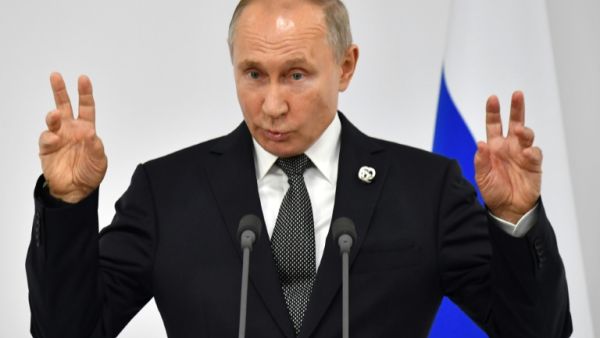 Conspiracy theories have long circulated suggesting that Putin had died and been replaced by a lookalike | © POOL/AFP/File | Yuri KADOBNOV