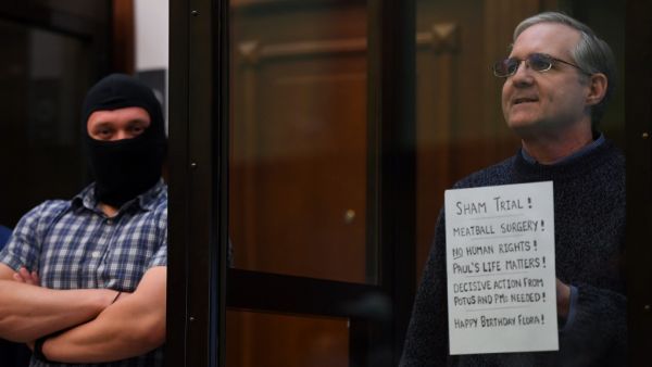 Paul Whelan, a former US marine accused of espionage and arrested in Russia in December 2018, stands inside a defendants' cage as he waits to hear his verdict in Moscow on June 15, 2020. Kirill KUDRYAVTSEV / AFP