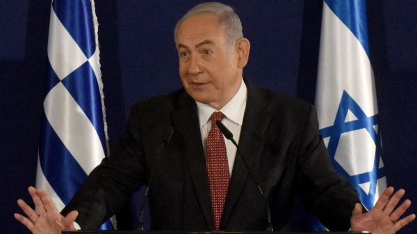 Israeli Prime Minister Benjamin Netanyahu delivers a press statement alongside his Greek counterpart in Jerusalem on June 16, 2020. DEBBIE HILL / POOL / AFP