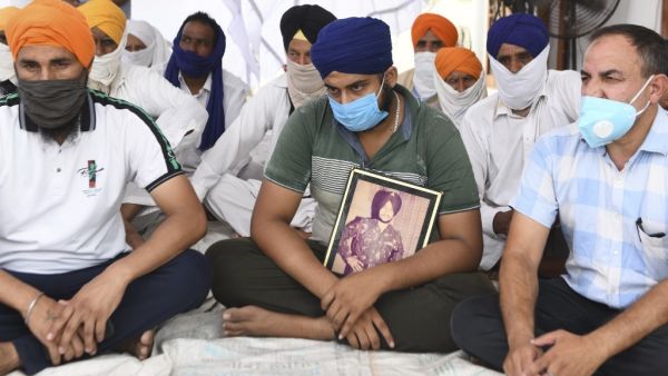 India and China agreed on June 17 to ease tensions at their disputed Himalayan border, even as they traded blame for a brawl that left at least 20 Indian soldiers dead. NARINDER NANU / AFP