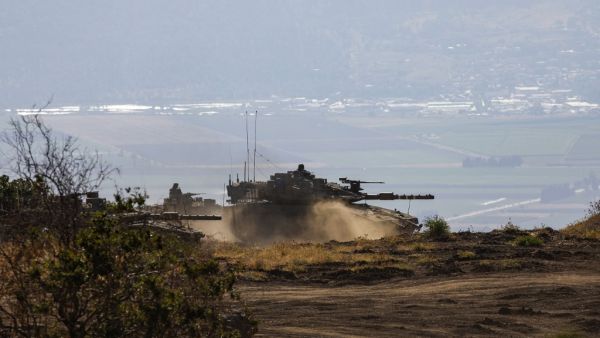 An Israeli army Merkava Mark IV tank takes part in a military drill in the Israeli-annexed Golan Heights on June 24, 2020. JALAA MAREY / AFP