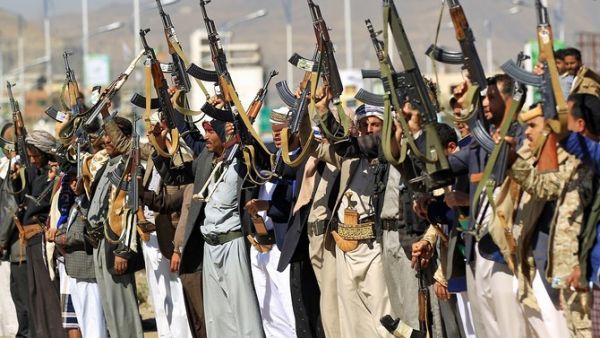 Armed Yemeni men hold their weapons as they gather in the capital Sanaa to show their support to the Houthis. (File/AFP)