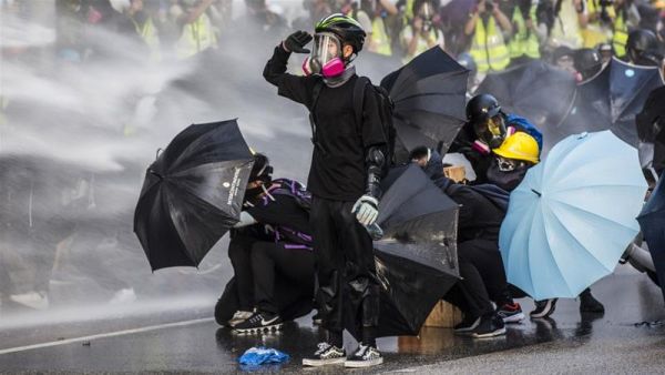 More than 6,000 people have been arrested, and nearly 3,000 people injured since protests began in June [Isaac Lawrence/AFP] 
