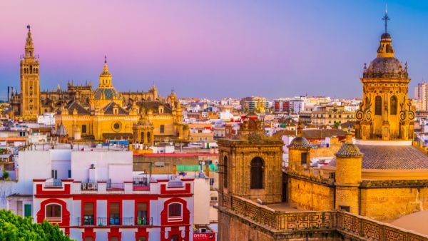 Seville, city skyline in the Old Quarter. Beautiful night photo of destination in Andalucia, Spain  (Shutterstock)	 