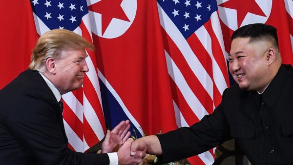 In this file photo taken on February 27, 2019 US President Donald Trump (L) shakes hands with North Korea's leader Kim Jong Un following a meeting at the Sofitel Legend Metropole hotel in Hanoi. The US pointman on North Korea voiced doubt June 29, 2020 that President Donald Trump and leader Kim Jong Un would meet again before US elections, although he held out hope for progress in nuclear negotiations. Saul LOEB / AFP