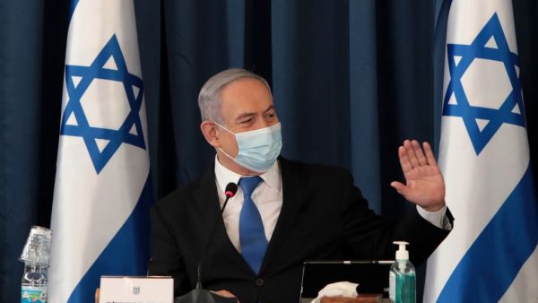 Israeli Prime Minister Benjamin Netanyahu wears a protective mask as he opens the weekly cabinet meeting at the foreign ministry in Jerusalem on July 5, 2020. GALI TIBBON / POOL / AFP