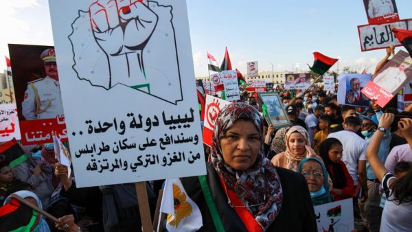 Supporters of Libyan military strongman Khalifa Haftar take part in a gathering in the eastern Libyan port city of Benghazi on July 5, 2020, to protest against Turkish intervention in the country's affairs. Abdullah DOMA / AFP