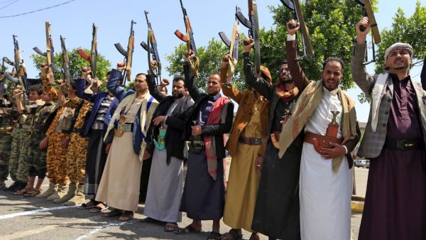Yemeni gunmen loyal to the Huthi movement brandish their weapons during a rally in the capital Sanaa, to show support to the movement against the Saudi-led intervention in the country on July, 7, 2020. Mohammed HUWAIS / AFP