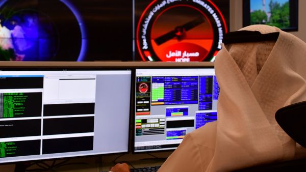 An employee works at the control room of the Mars Mission at the Mohammed Bin Rashid Space Centre (MBRSC), in the Gulf city of Dubai. The oil-rich United Arab Emirates has built a nuclear power programme and sent a man to space, and now plans to join another elite club by sending a probe to Mars. (AFP)