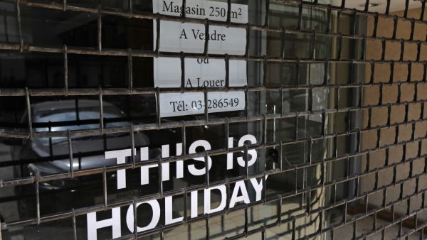 A closed shop for rent or sale in the upmarket area of Kaslik, north of Lebanon's capital Beirut, is pictured on July 16, 2020. The International Monetary Fund warned of the high cost of holding up reforms in Lebanon, two months into bailout talks to redress its nosediving economy. JOSEPH EID / AFP