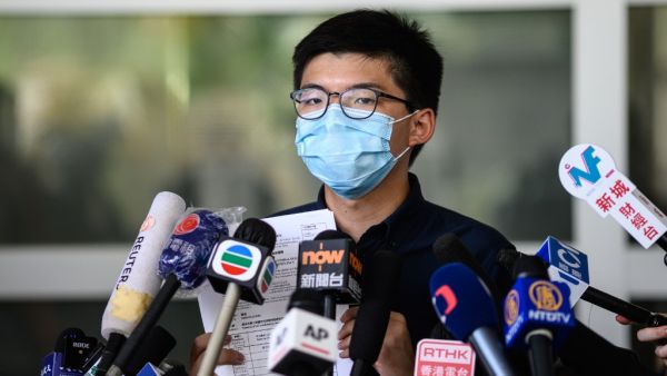 Pro-democracy activist Joshua Wong speaks to the press as he announces his intention to run for the Legislative Council general election in Hong Kong on July 20, 2020. ANTHONY WALLACE / AFP