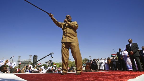 In this file photo taken on January 9, 2019, Sudan's President Omar al-Bashir speaks during a rally with his supporters in the Green Square in the capital Khartoum. Sudan's former autocratic president Omar al-Bashir, ousted amid a popular pro-democracy uprising last year, faces court from July 21 over the coup that brought him to power over three decades ago. ASHRAF SHAZLY / AFP