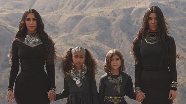he budding law student, who is studying to take the bar in California, baptized her three youngest children in Armenia last year  (Instagram )