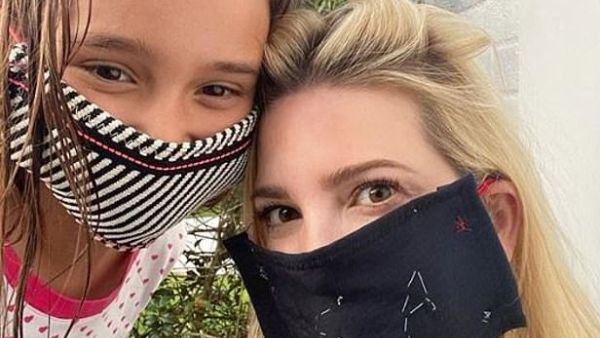 She had previously urged others to wear masks while posting this picture with her daughter Arabella (Instagram)
