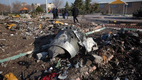 Rescue teams work amidst debris after a Ukrainian plane crashed near Imam Khomeini airport in Tehran. (File photo/ AFP)