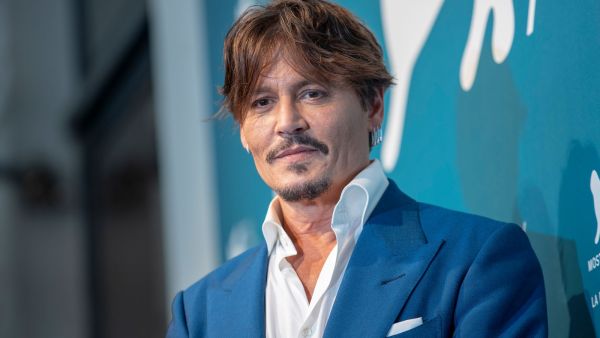 The 57-year-old denies abusing actress Amber Heard — now 34 and the global face of French cosmetics firm L’Oreal