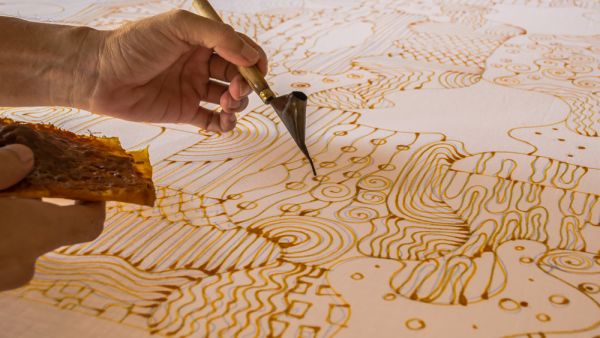 Candles line paint fabric batik. (Shutterstock/ File Photo)