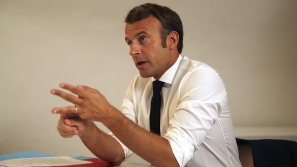 French President Emmanuel Macron speaks during a Defense Council video-conference on Niger at the Fort de Bregancon, southern France on August 11, 2020. Armed forces from Niger and France have been deployed to pursue the gunmen who killed seven aid workers, mostly French citizens, and a leading guide in a Niger giraffe park considered one of the safer places in the vast West African country. On August 9, 2020, gunmen on motorcycles killed eight people including a group of French aid workers as they visited 