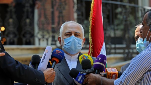 Iran's Foreign Minister Mohammad Javad Zarif, mask-clad due to the COVID-19 coronavirus pandemic, speaks to reporters at Lebanon's foreign ministry headquarters in the capital Beirut on August 14, 2020. ANWAR AMRO / AFP