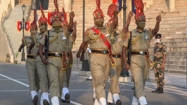 Indian Border Security Force (BSF) personnel perform during the daily beating of the retreat ceremony on the occasion of the country's 74th Independence Day at the India-Pakistan Wagah Border Post, about 35 kms from Amritsar on August 15, 2020. NARINDER NANU / AFP