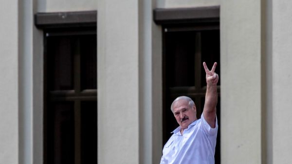 Belarus' President Alexander Lukashenko gestures during a rally held to support him in central Minsk, on August 16, 2020. Siarhei LESKIEC / AFP