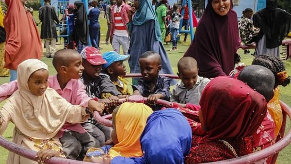 The bill will also allow child marriage once a girl's sexual organs mature. Pictured: Children play during the Muslim festival Eid Al-Adha, the Festival of Sacrifice, at a recreational park in Mogadishu, on July 31 (AFP)