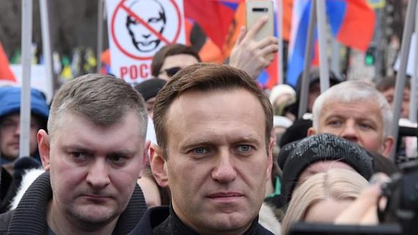 Navalny, a long-time critic of Putin, is pictured above at a march in memory of murdered Kremlin critic Boris Nemtsov in Moscow in February 2020. (AFP)