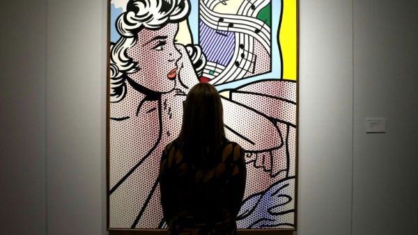 Christie's sold Roy Lichtenstein's "Nude with Joyous Painting" for $46.2 million (AFP Photo/TIMOTHY A. CLARY)