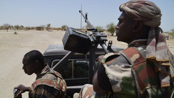 Nigerien soldiers patrol along the Niger border near the south-eastern city of Bosso. (ISSOUF SANOGO/AFP/Getty Images)