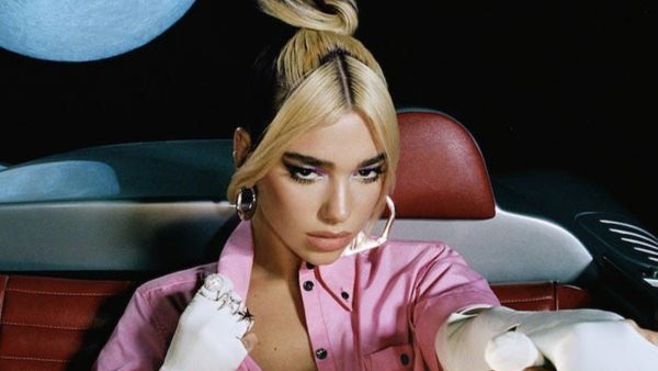  Dua Lipa Wows in a Peach Shorts Suit as She Dotes on Precious Pooch Dexter