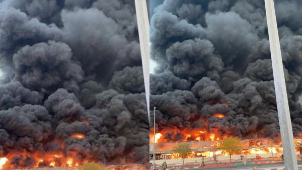 Thick plumes of black smoke rising to the sky as the fire raged. (Twitter)