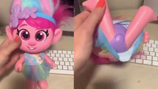 A Trolls doll has been pulled from shelves after a disgusted mother shared a video of it making 'sexual sounds' when a button on its 'privates' is pressed. (Twitter)