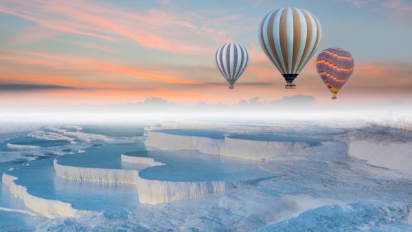 Hot air balloon flying over spectacular Pamukkale  (Shutterstock)	