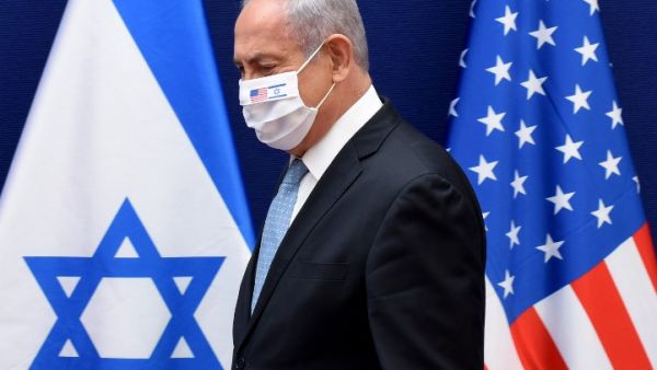 Israeli Prime Minister Benjamin Netanyahu arrives wearing a protective mask to make joint statements to the press with US Presidential Adviser Jared Kushner (unseen) after their meeting in Jerusalem, on August 30, 2020, about the Israel - United Arab Emirates agreement to normalise relations. DEBBIE HILL / AFP / POOL