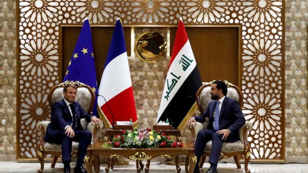 French President Emmanuel Macron (L) meets with the Speaker of the Iraqi Parliament Mohammed al-Halbousi, in the capital Baghdad, on September 2, 2020. GONZALO FUENTES / POOL / AFP