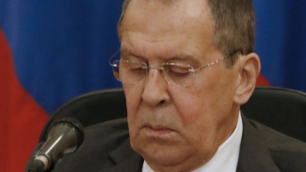 Russian Foreign Minister Sergei Lavrov checks his notes during a joint press conference with his Syrian counterpart (unseen) after meeting in Syria's capital Damascus, on September 7, 2020. LOUAI BESHARA / AFP