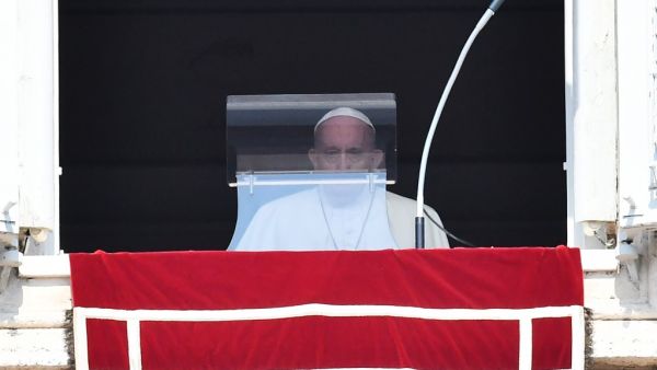 Pope Francis arrives for the weekly Angelus prayer from the window of the apostolic palace overlooking St. Peter's Square on September 13, 2020 in The Vatican, within the COVID-19 infection, caused by the novel coronavirus. Vincenzo PINTO / AFP