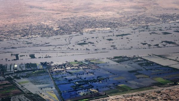 This picture taken on September 14, 2020 aboard an aircraft of the Bahrain Royal Charity Organisation (RCO) shows an aerial view of flooded parts of Sudan's capital Khartoum. Sudanese authorities earlier in September had declared a nationwide three-month state of emergency after record-breaking torrential floods, with the country's top officials urging the international community to step their aid efforts. Mazen Mahdi / AFP