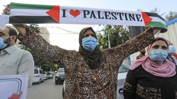 Palestinians protest in Gaza City against Israeli normalisation deals with the United Arab Emirates and Bahrain on September 15, 2020, hours ahead of a signing ceremony at the White House. The decision by the UAE and Bahrain to normalise ties with Israel breaks with decades of consensus within the Arab world that a peace deal with the Palestinians is a prerequisite for establishing relations with the Jewish state. MAHMUD HAMS / AFP
