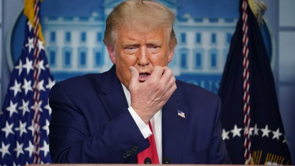 US President Donald Trump gestures as he speaks about masks during a press conference in the Brady Briefing Room of the White House on September 16, 2020, in Washington, DC. MANDEL NGAN / AFP