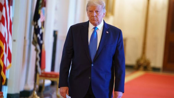US President Donald Trump arrives for an event honoring Bay of Pigs veterans in the East Room of the White House in Washington, DC on September 23, 2020. MANDEL NGAN / AFP